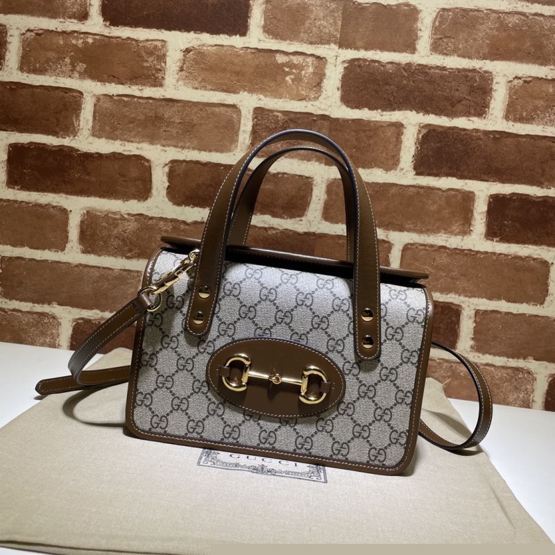 G*u*i top handle bags